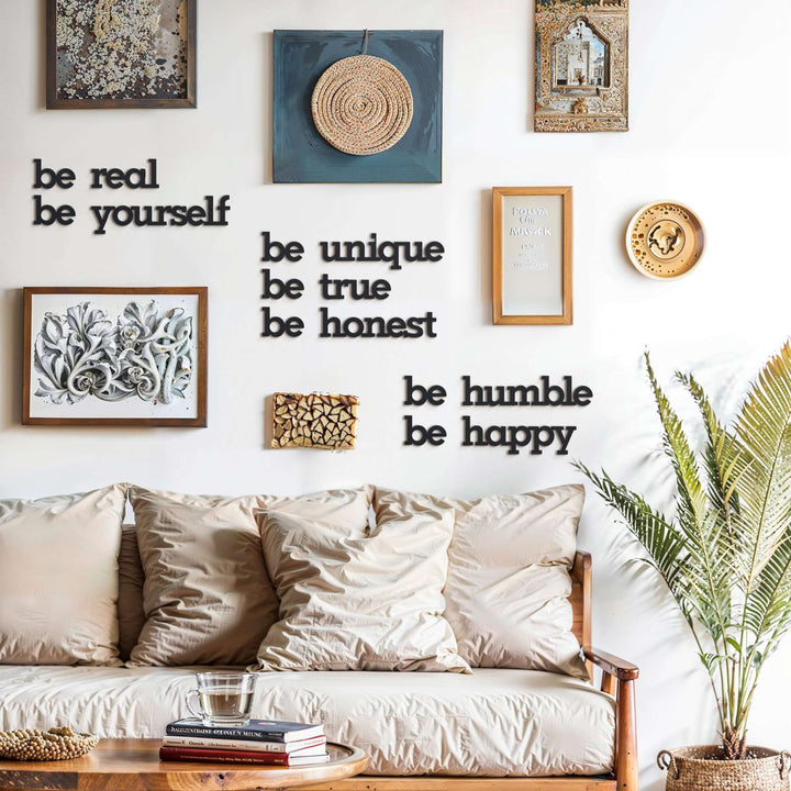 Matte black modern industrial metal wall art reading ‘Be Yourself – Be Real – Be Unique – Be Honest – Be Humble – Be Happy’ — seven 2 mm thick steel quote pieces, easy no‑drill adhesive installation, customizable floating layout for indoor or outdoor décor