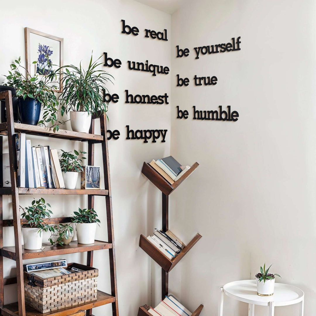 Matte black modern industrial metal wall art reading ‘Be Yourself – Be Real – Be Unique – Be Honest – Be Humble – Be Happy’ — seven 2 mm thick steel quote pieces, easy no‑drill adhesive installation, customizable floating layout for indoor or outdoor décor