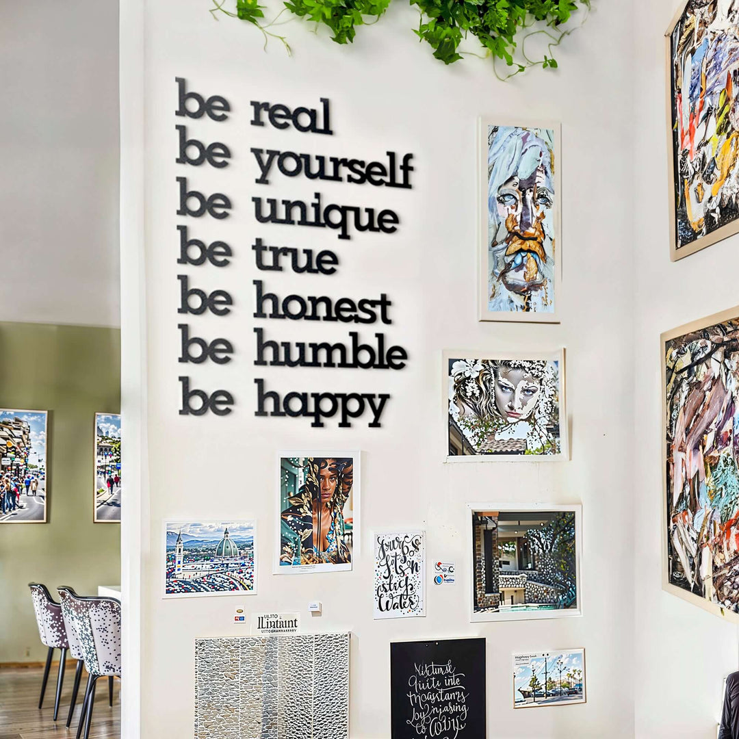 Matte black modern industrial metal wall art reading ‘Be Yourself – Be Real – Be Unique – Be Honest – Be Humble – Be Happy’ — seven 2 mm thick steel quote pieces, easy no‑drill adhesive installation, customizable floating layout for indoor or outdoor décor