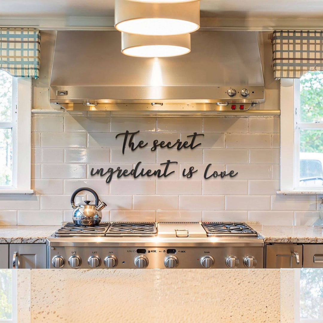 Matte black modern industrial metal wall art reading ‘The Secret Ingredient Is Love’—five 2 mm thick steel pieces, easy no‑drill adhesive installation, customizable layout for kitchen or outdoor décor