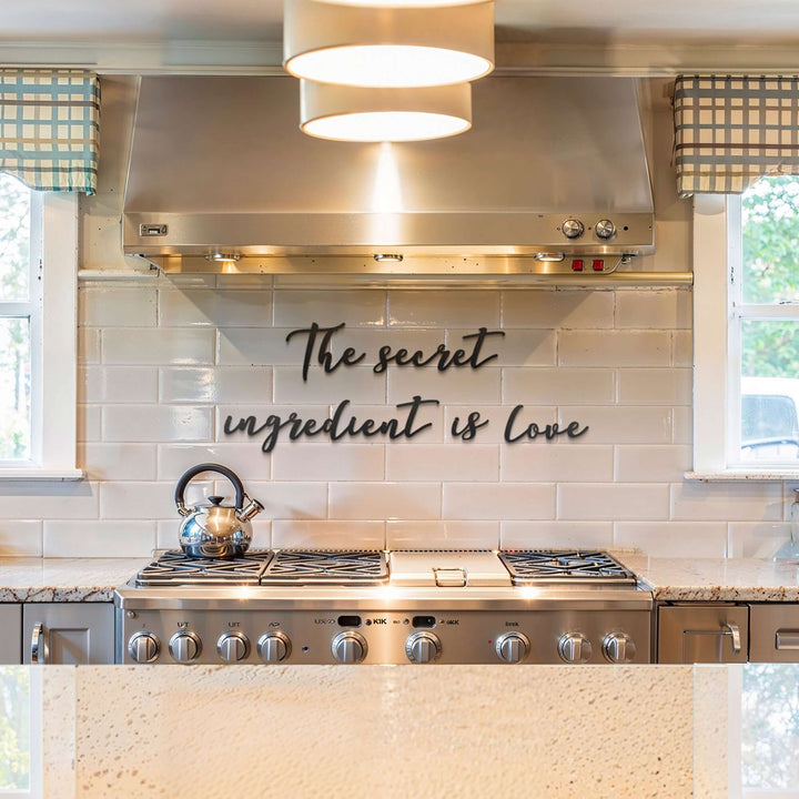 Matte black modern industrial metal wall art reading ‘The Secret Ingredient Is Love’—five 2 mm thick steel pieces, easy no‑drill adhesive installation, customizable layout for kitchen or outdoor décor