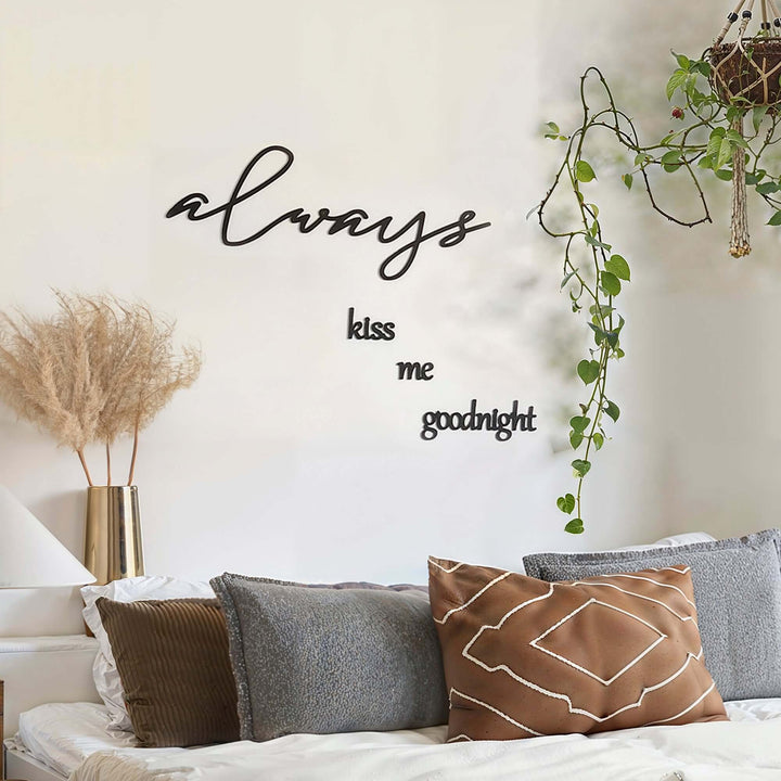 Matte black modern industrial metal wall art reading ‘Always Kiss Me Goodnight’ — four 2 mm thick steel pieces with easy no‑drill adhesive strips, customizable layout for romantic bedroom or indoor/outdoor décor